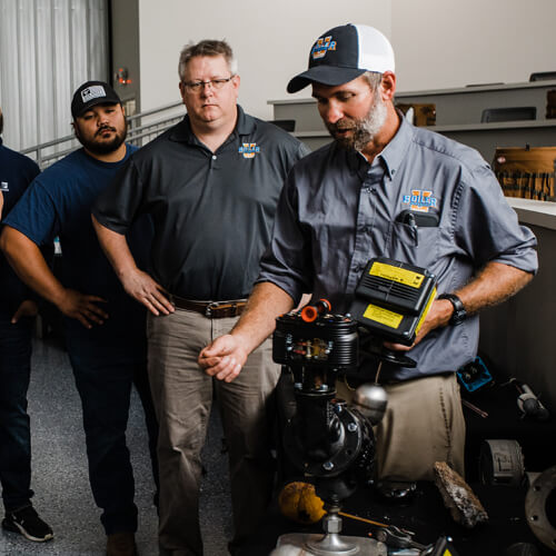 Instructor demonstrating steam trap operation